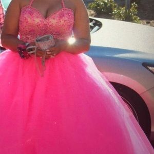 Black mermaid gown. Pink ball gown